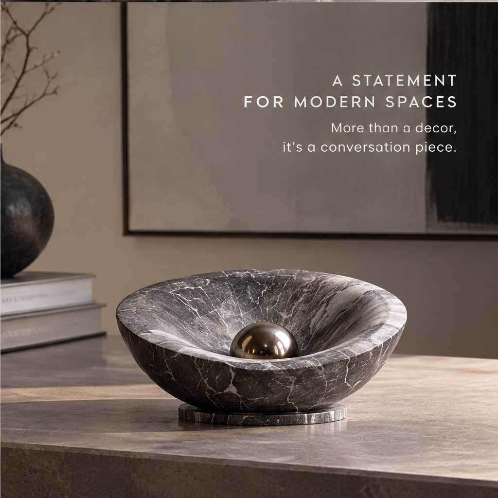 HOMZURE dark veined decorative bowl sculpture styled on a console beside books and a vase